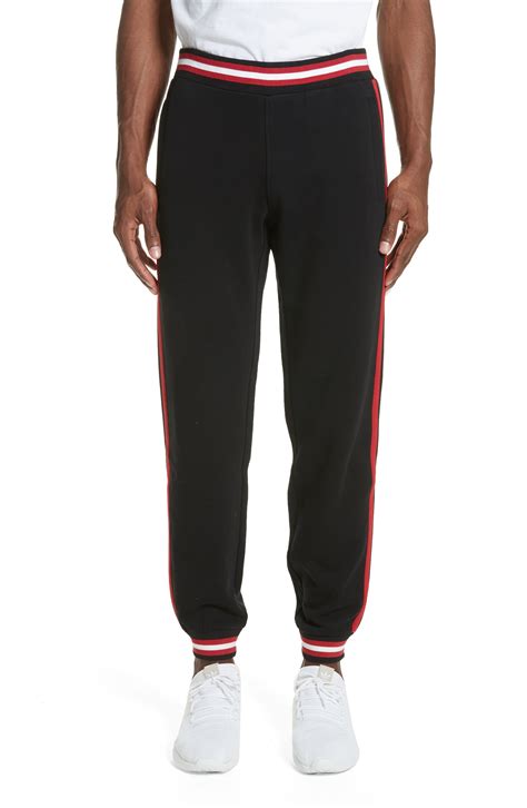 pantaloni givenchy|givenchy track pants.